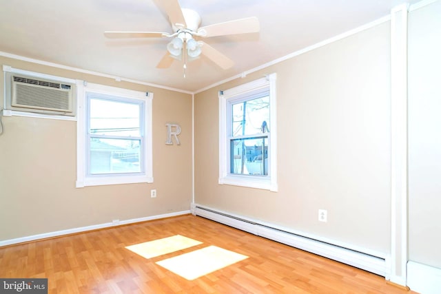 spare room with crown molding, wood finished floors, a wall mounted air conditioner, and a baseboard radiator