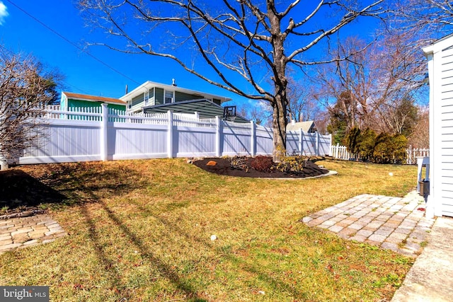 view of yard with a patio area and fence