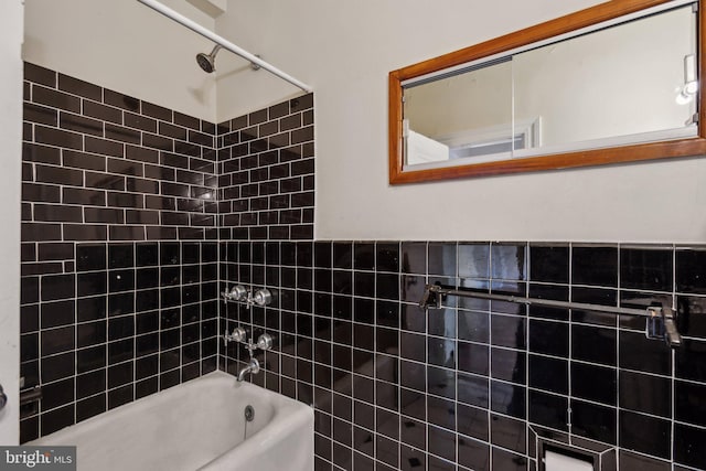 bathroom with shower / bath combination