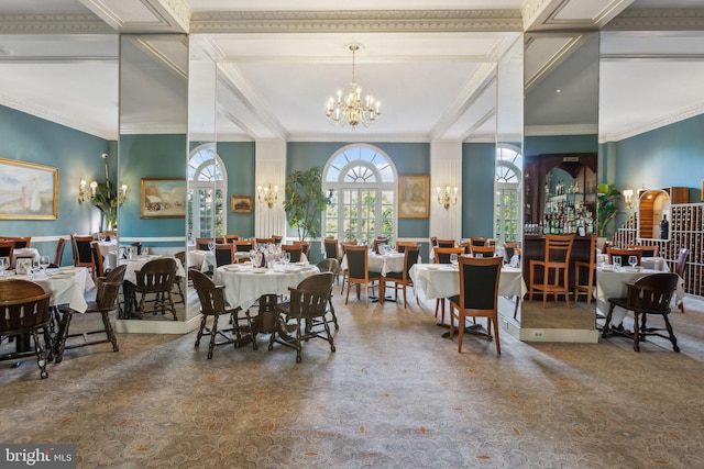 dining space with a notable chandelier and ornamental molding