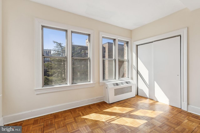 interior space featuring baseboards and radiator heating unit