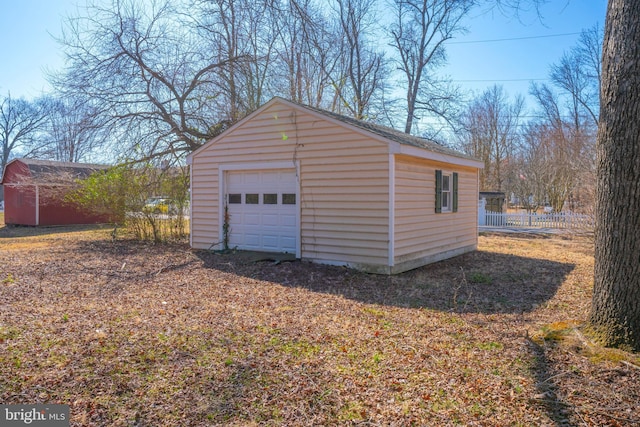 detached garage with fence