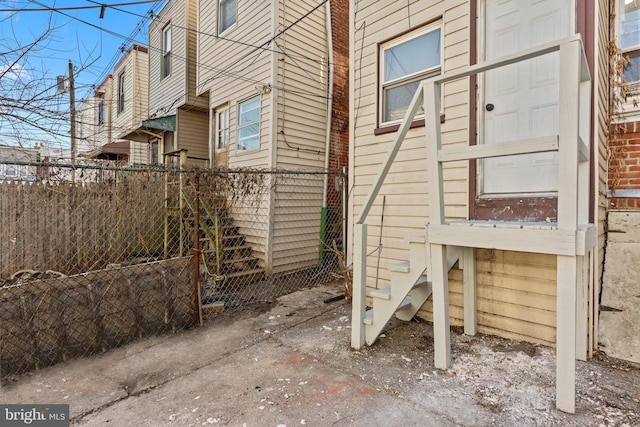 view of property exterior with fence