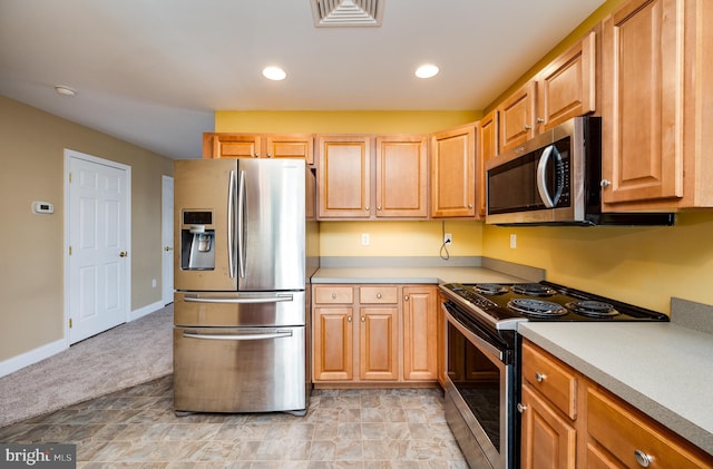 kitchen with visible vents, baseboards, light countertops, recessed lighting, and appliances with stainless steel finishes