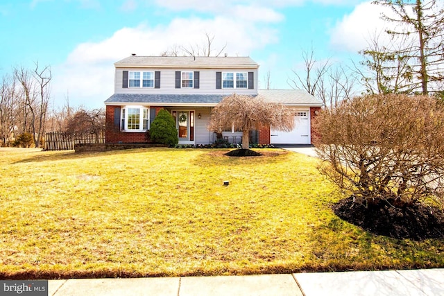 traditional-style home featuring brick siding and a front lawn