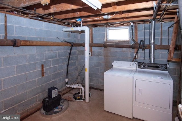 washroom with washer and dryer and laundry area