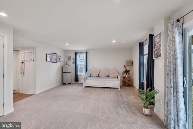 unfurnished bedroom with recessed lighting, baseboards, and carpet