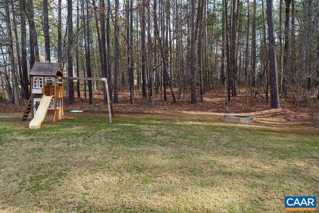 view of yard with a playground