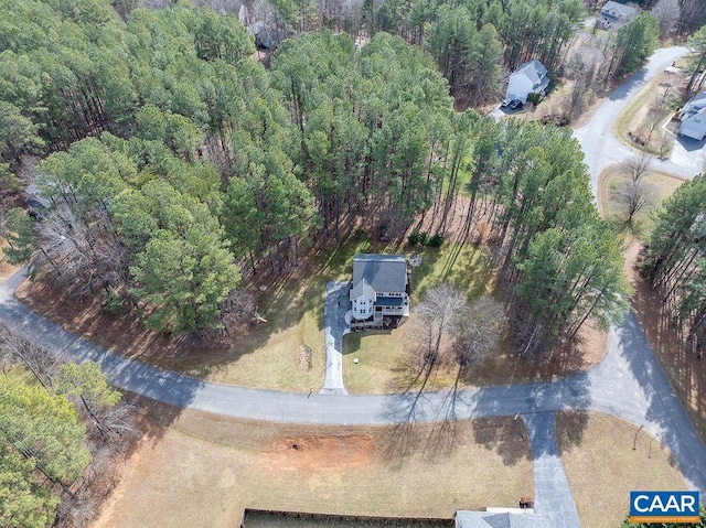 aerial view featuring a forest view