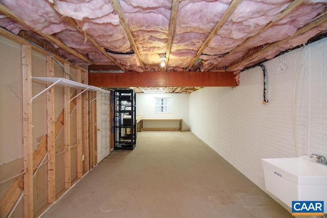 basement with a sink