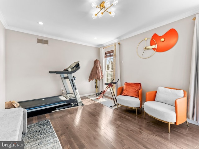 exercise room featuring wood finished floors, baseboards, visible vents, recessed lighting, and ornamental molding