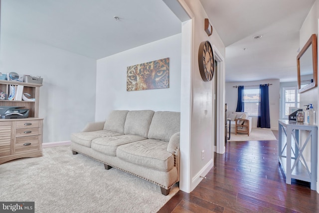 living room with baseboards and hardwood / wood-style floors