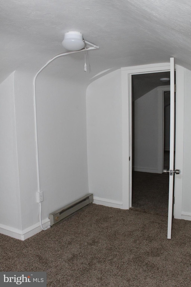 208 S Brewster Rd, Vineland, NJ 08361 - interior space featuring carpet, baseboard heating, and a textured ceiling
