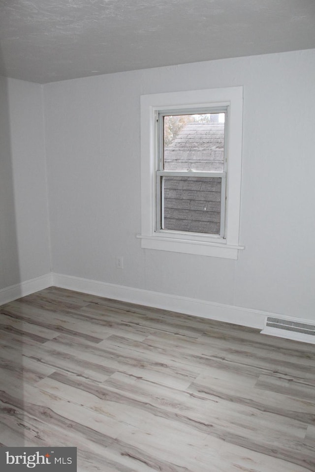 208 S Brewster Rd, Vineland, NJ 08361 - spare room featuring baseboards and visible vents