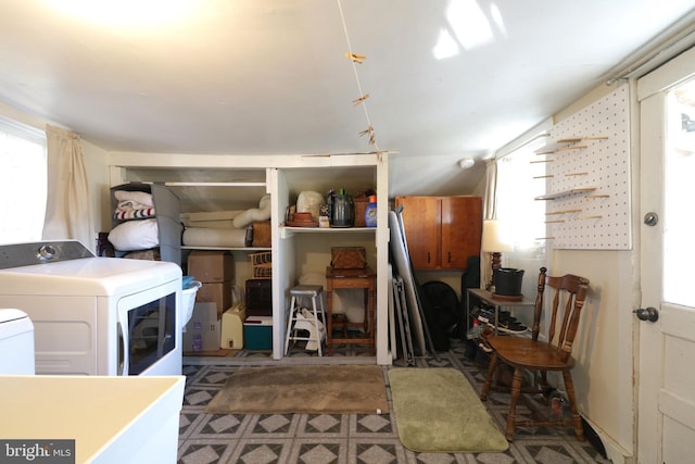 laundry area featuring washing machine and clothes dryer