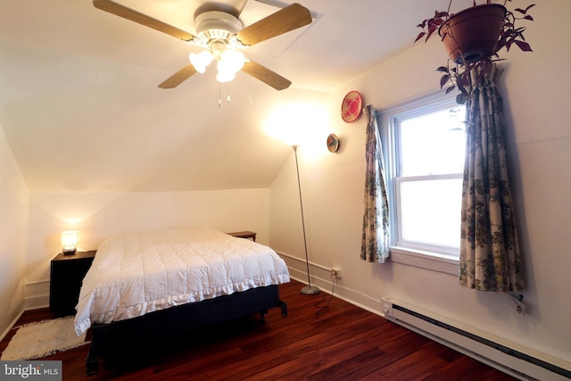 bedroom featuring wood finished floors, baseboards, a ceiling fan, vaulted ceiling, and a baseboard heating unit