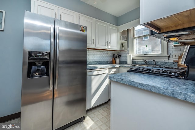 kitchen with dishwashing machine, white cabinetry, stainless steel refrigerator with ice dispenser, and decorative backsplash