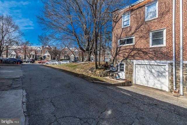 view of road featuring a residential view