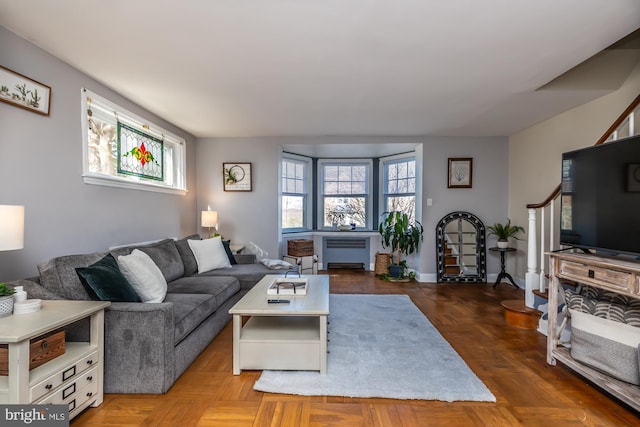 living room featuring radiator