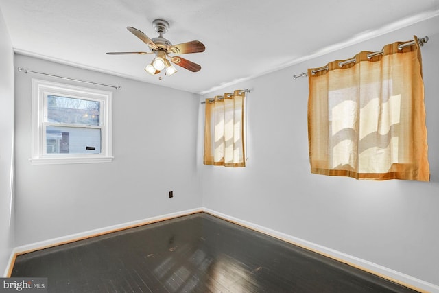 empty room featuring ceiling fan