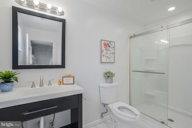 full bath with vanity, a shower stall, toilet, and marble finish floor