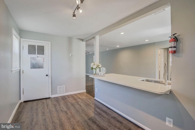 kitchen featuring recessed lighting, visible vents, baseboards, and wood finished floors