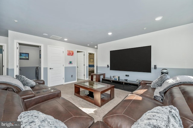 carpeted living room with recessed lighting