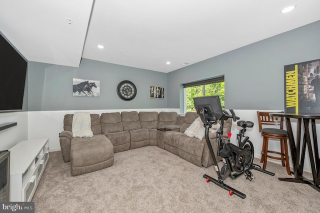 carpeted living room featuring recessed lighting