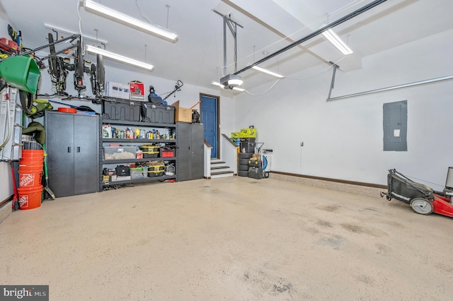 garage with electric panel and a garage door opener