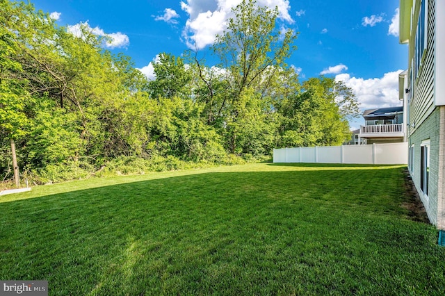 view of yard with fence