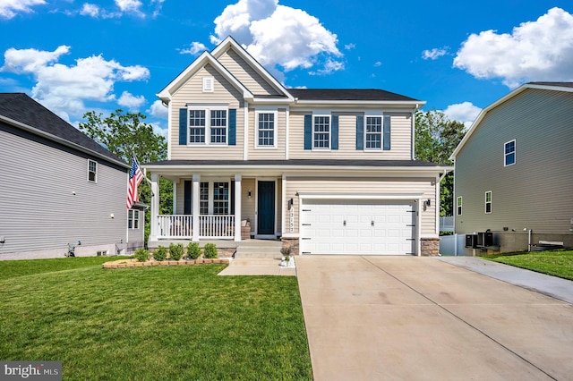 view of front facade featuring a porch, a front yard, cooling unit, a garage, and driveway