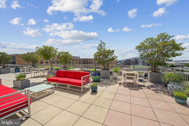 view of patio / terrace with an outdoor living space and outdoor dining area