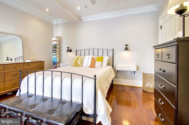 bedroom featuring crown molding, baseboards, and wood-type flooring