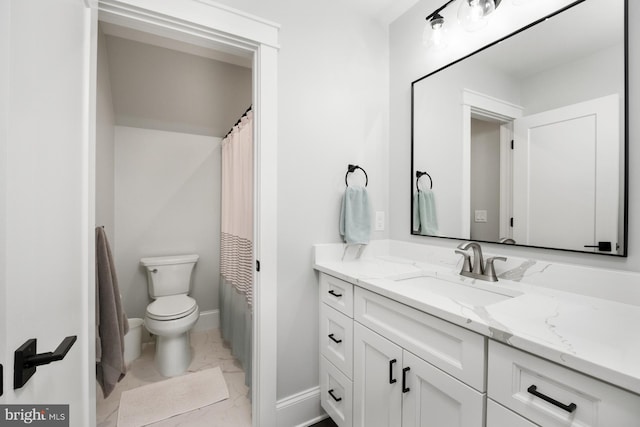 286 Claremont Ave, Harrisonburg, VA 22801 - bathroom featuring vanity, toilet, baseboards, and marble finish floor