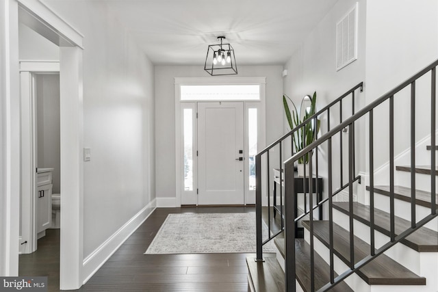 286 Claremont Ave, Harrisonburg, VA 22801 - entrance foyer with visible vents, baseboards, dark wood finished floors, and stairway