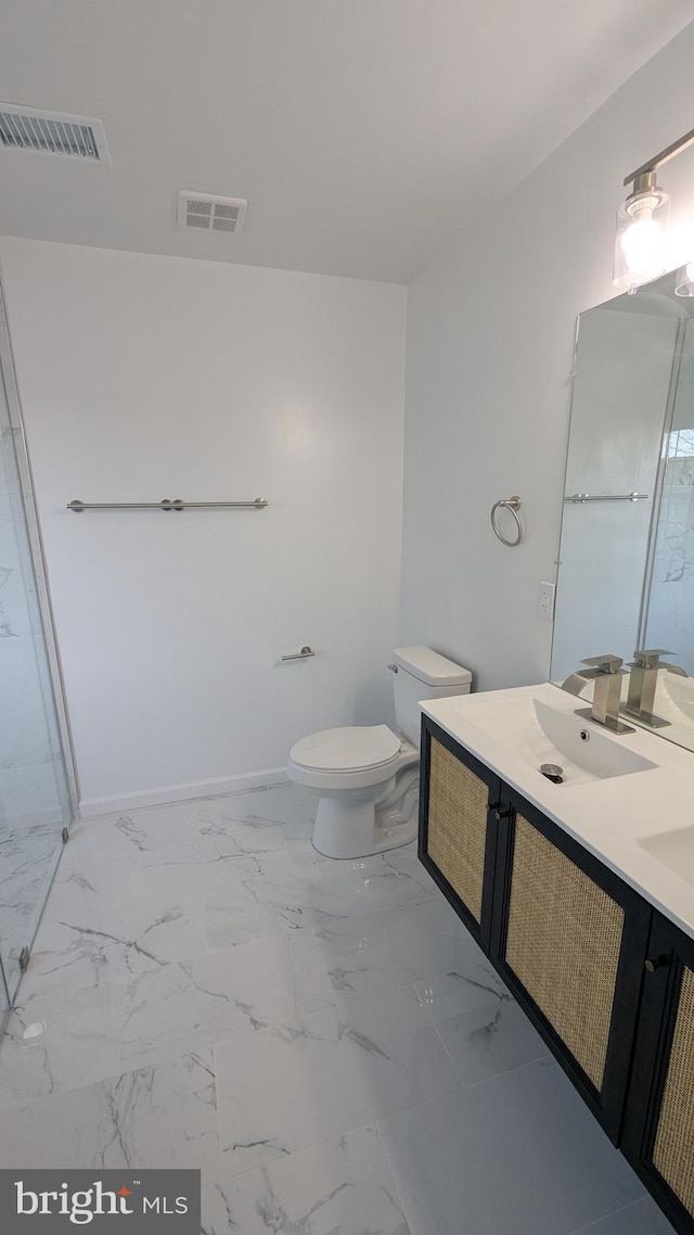 full bath featuring double vanity, visible vents, toilet, and a sink