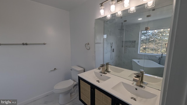 full bath with marble finish floor, toilet, and a sink