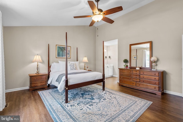 bedroom with ensuite bath, a ceiling fan, baseboards, and wood finished floors