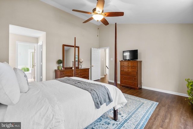 bedroom with high vaulted ceiling, a ceiling fan, dark wood finished floors, connected bathroom, and baseboards