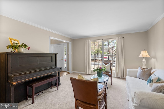 living room with light colored carpet, baseboards, and ornamental molding