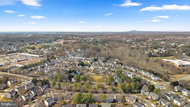 birds eye view of property with a residential view