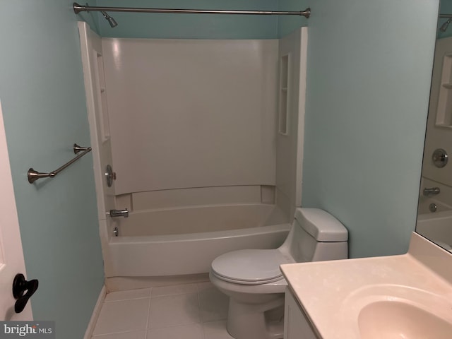 bathroom with vanity, toilet, tub / shower combination, and tile patterned flooring