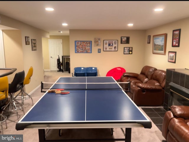 recreation room featuring tile patterned flooring, recessed lighting, and baseboards