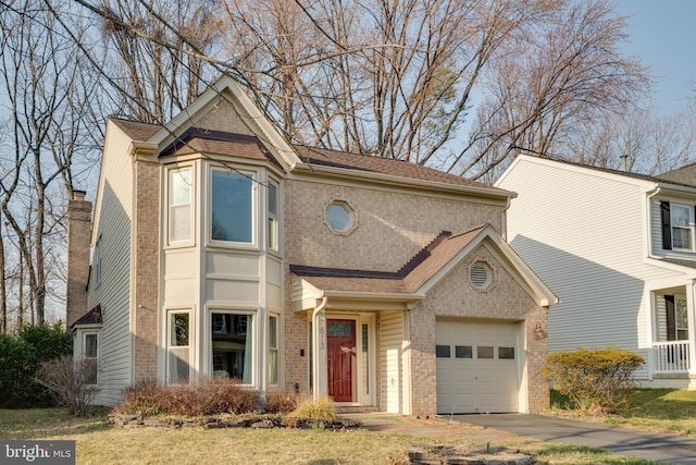 traditional home with brick siding, driveway, and a shingled roof