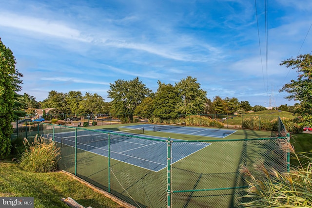 view of sport court with community basketball court and fence