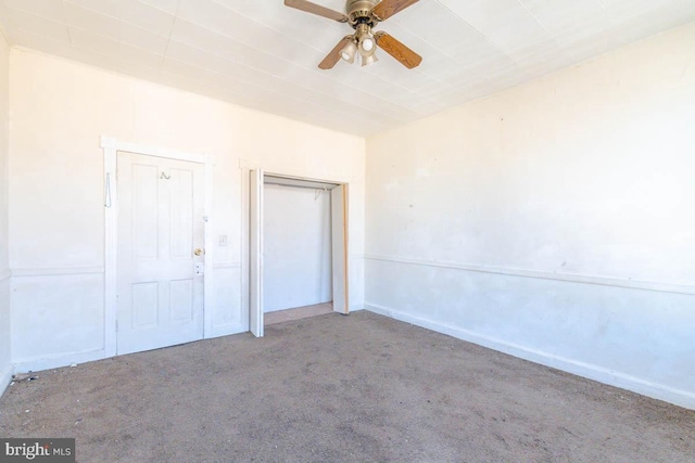 unfurnished bedroom with carpet flooring and a ceiling fan