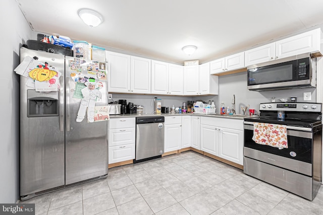 123 S 9th St, Millville, NJ 08332 - kitchen with a sink, stainless steel appliances, and white cabinetry