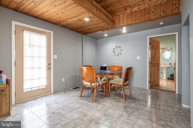 123 S 9th St, Millville, NJ 08332 - tiled dining space with a wealth of natural light and wood ceiling