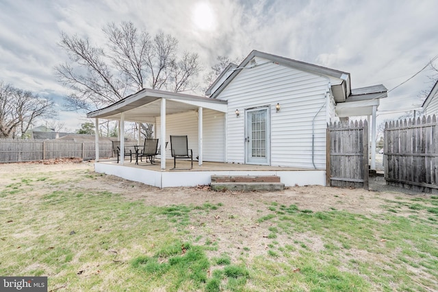 123 S 9th St, Millville, NJ 08332 - back of property with a yard, a patio area, and fence