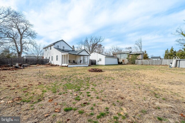 123 S 9th St, Millville, NJ 08332 - view of yard with a fire pit and a fenced backyard